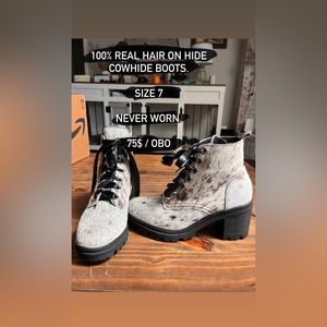 Black and white speckled cowhide boots.